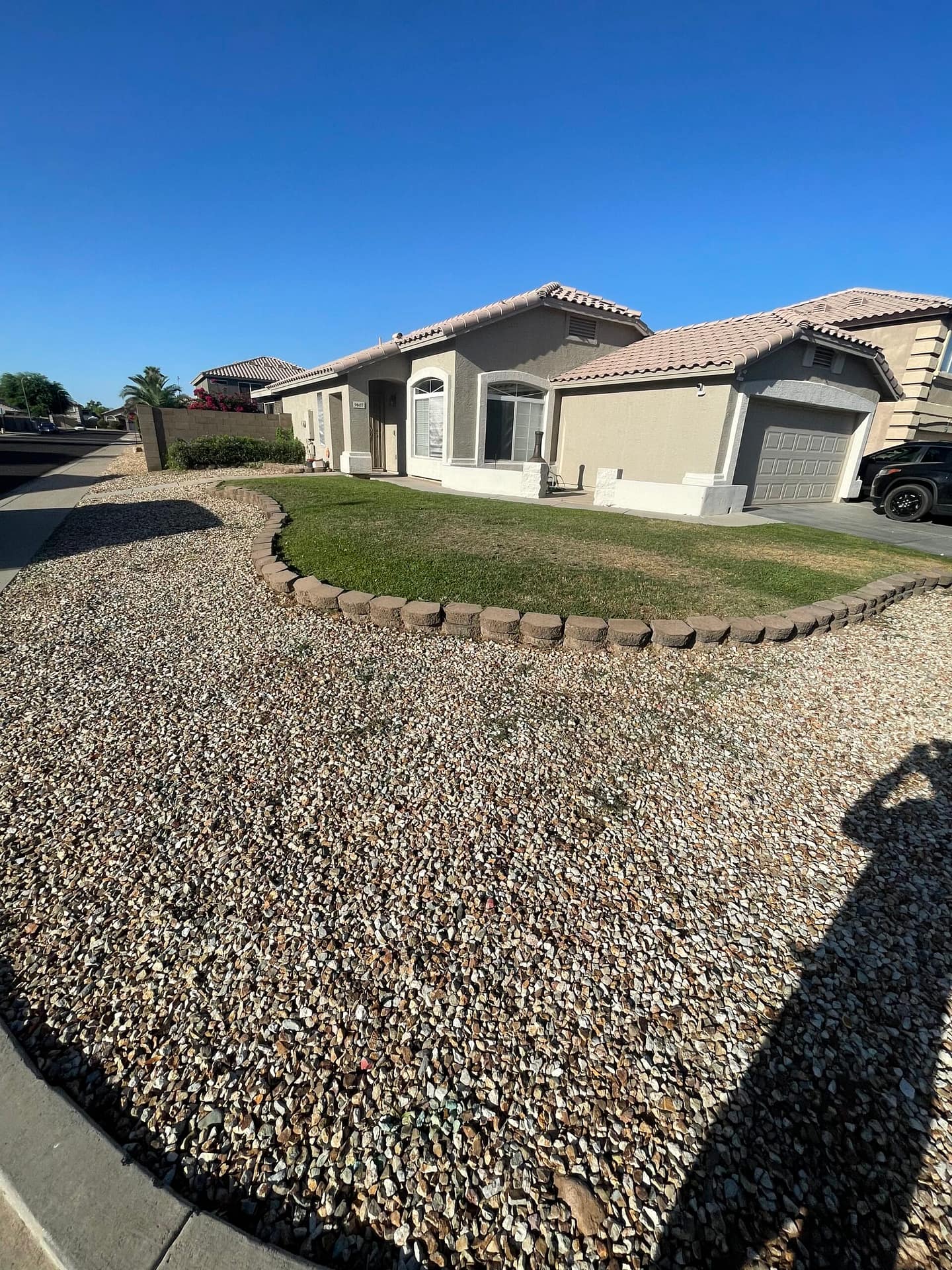 Breasy reviewing a Scottsdale hardscape scope against HOA requirements