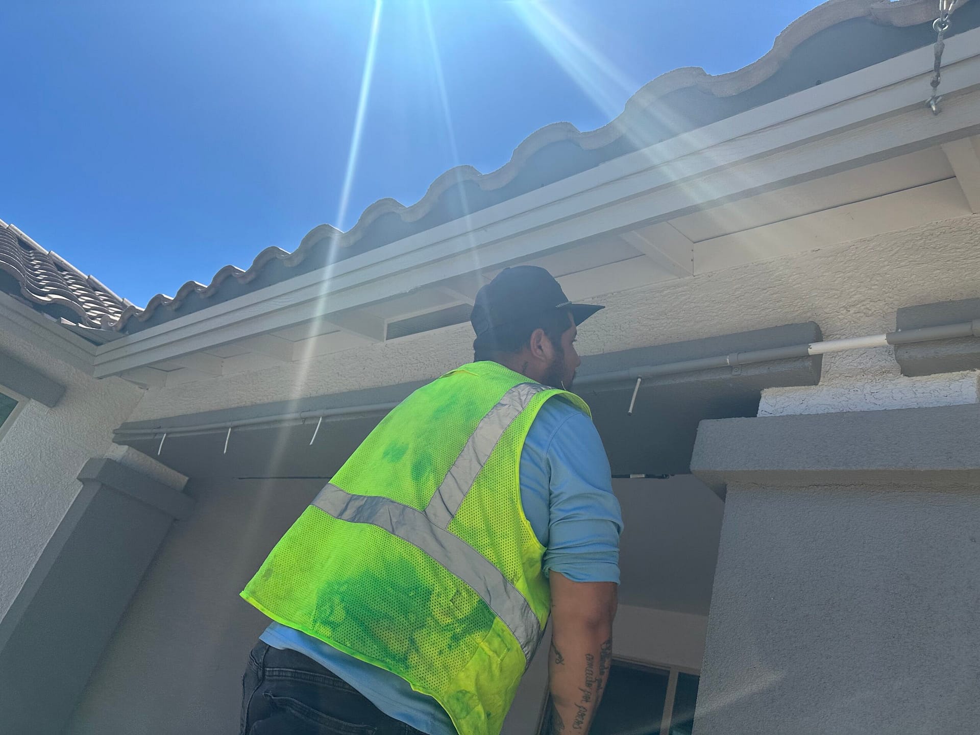 Completed exterior painting job with before-and-after documentation on a Scottsdale rental