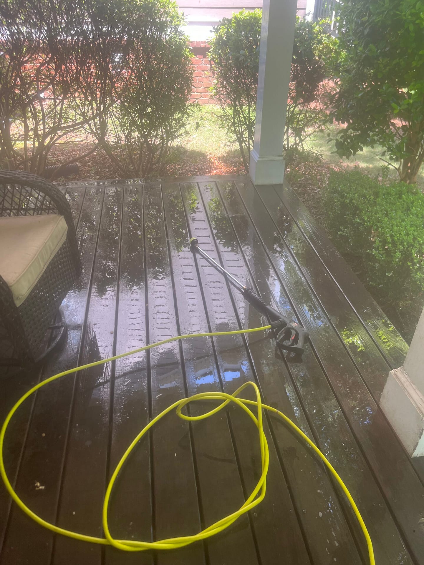 Breasy reviewing exterior surfaces before a Chandler pressure washing visit