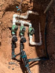 Diagnosing a hard water plumbing issue at a Chandler property