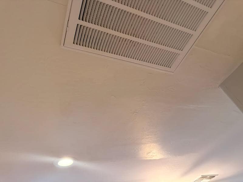 Freshly painted ceiling and recessed lighting at a Cave Creek property