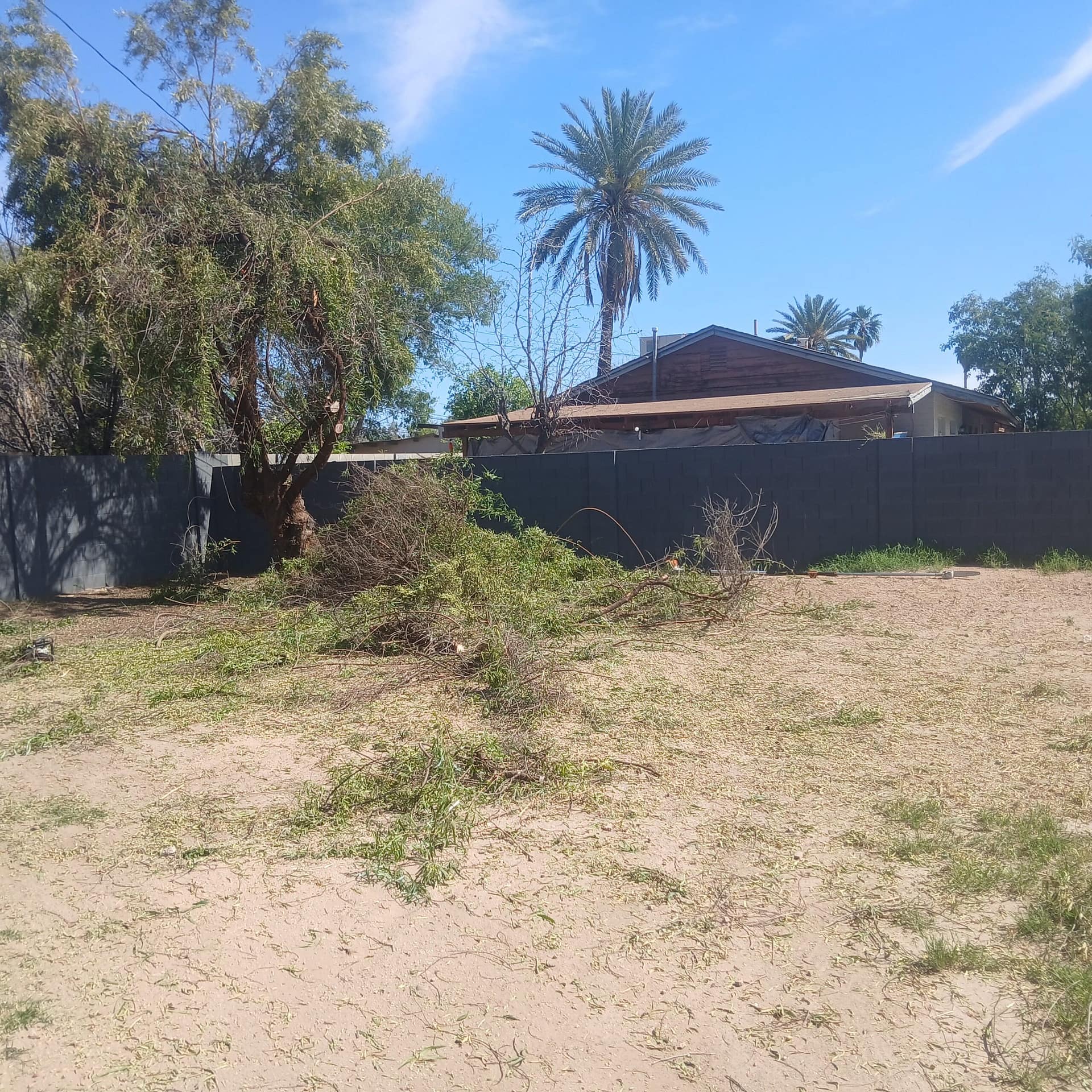 Before-and-after photo documentation closing out an HOA violation in Cave Creek