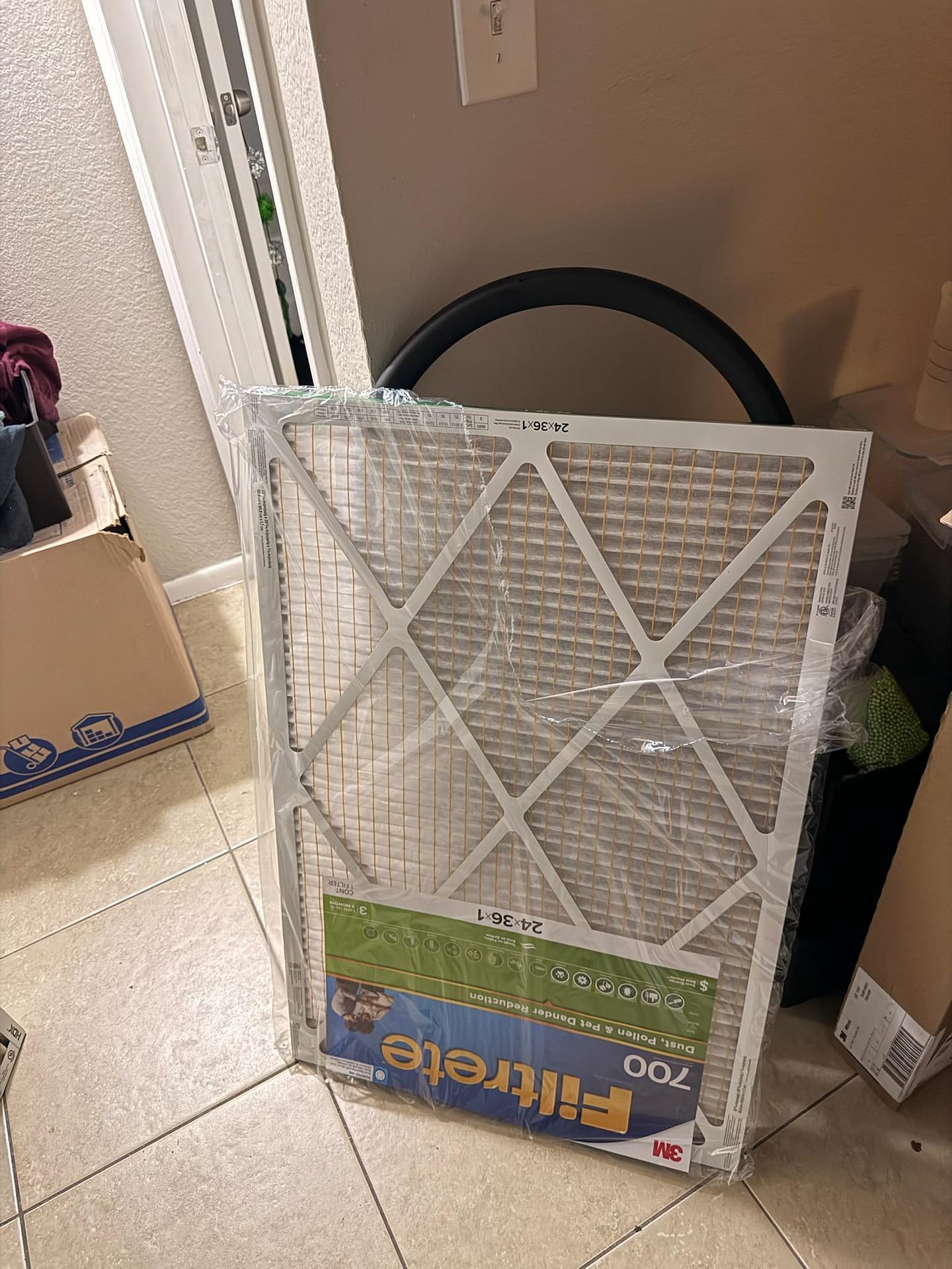 Dust-loaded air filter pulled from a Chandler rental property after monsoon season